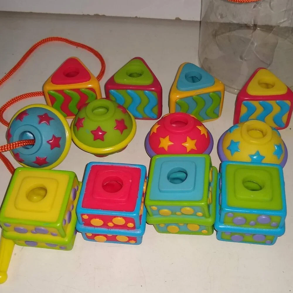 International Playthings Inc. Earlyears Lace a Shape no fell lacing 12 Beads set